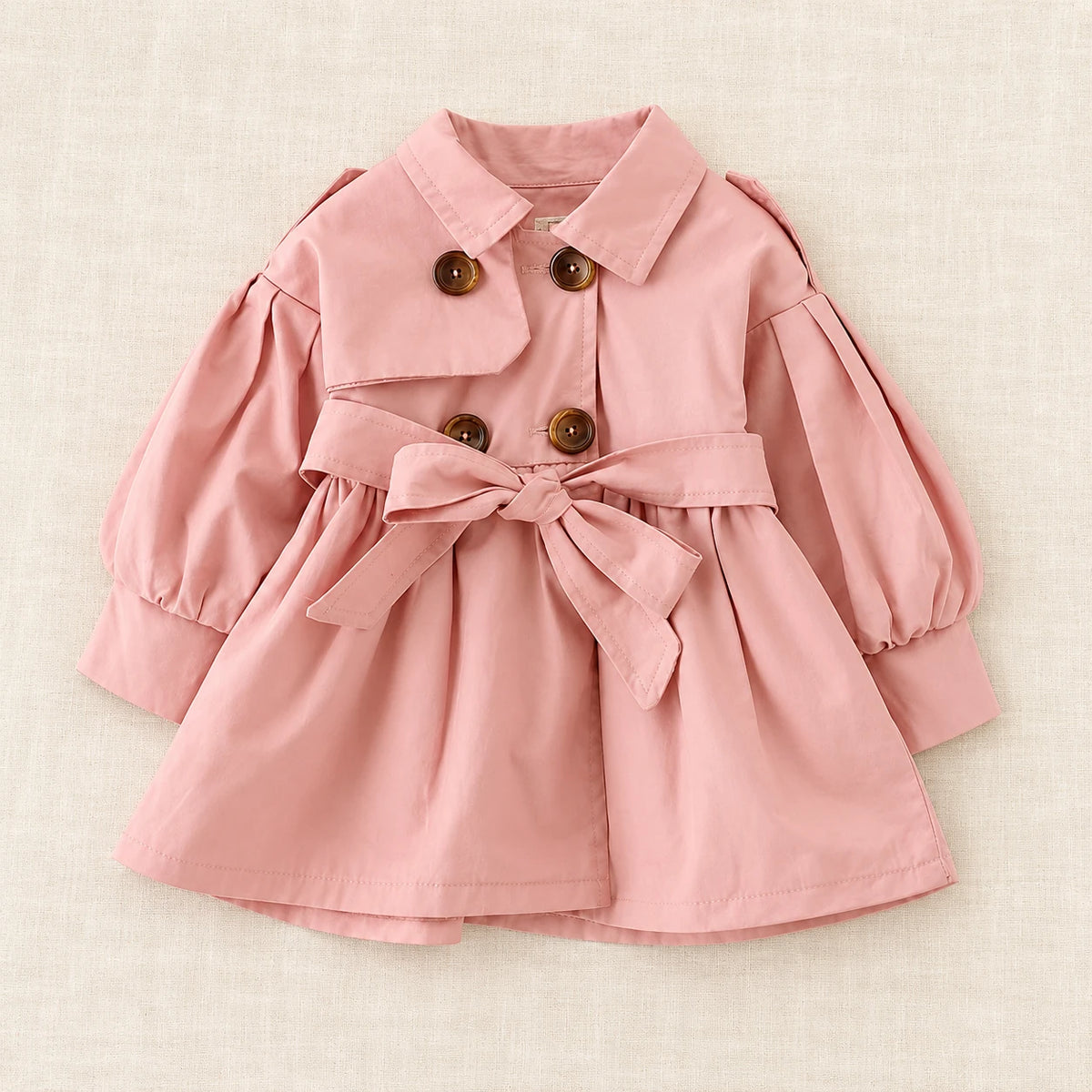 The Classic Little Trench Coat — Pink — studio product photograph