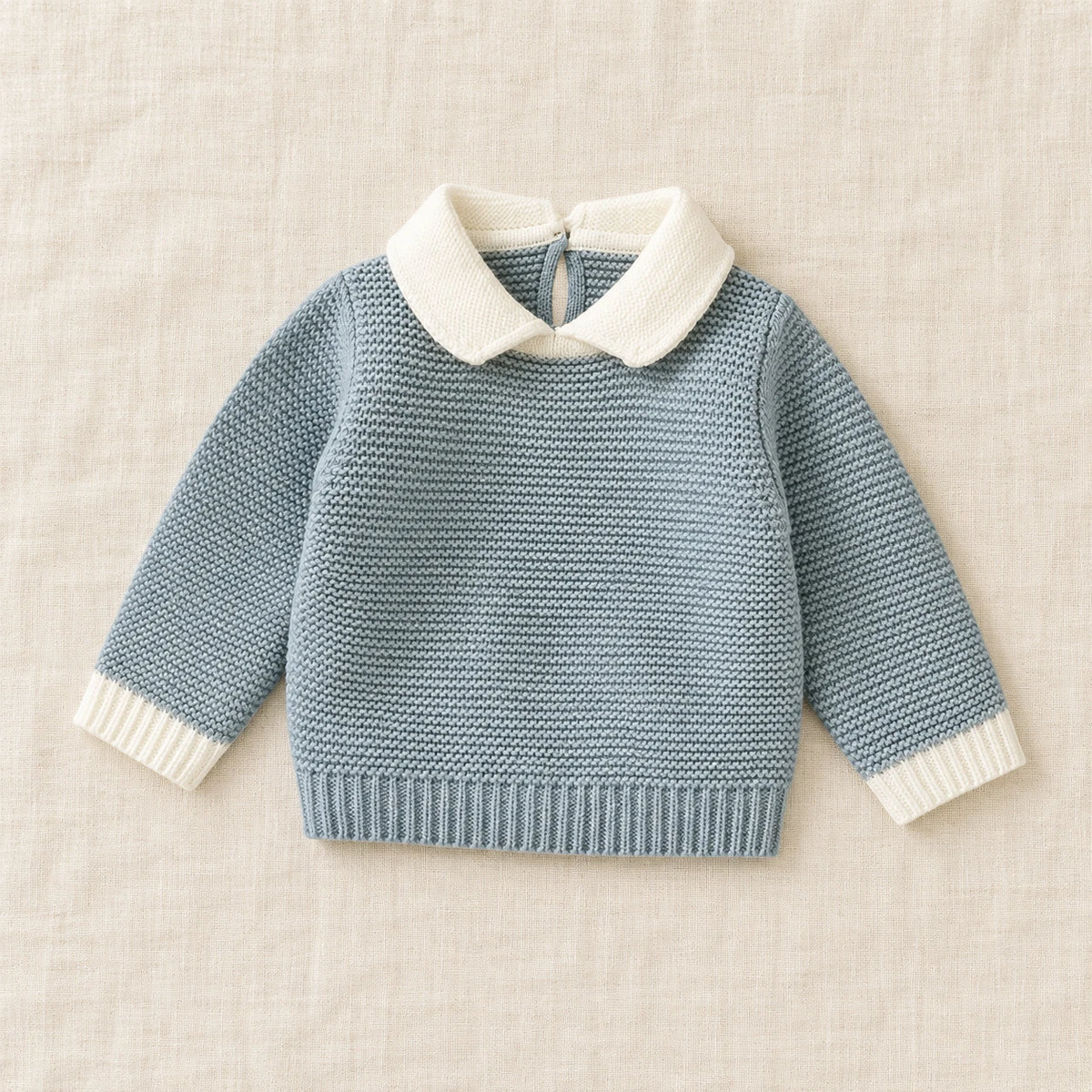 The Contrast-Collar Knit Sweater — Blue — studio product photograph