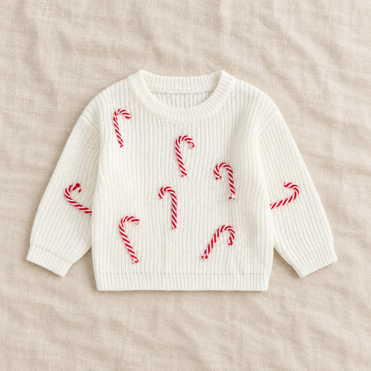 The Candy Cane Knit Sweater — White — studio product photograph