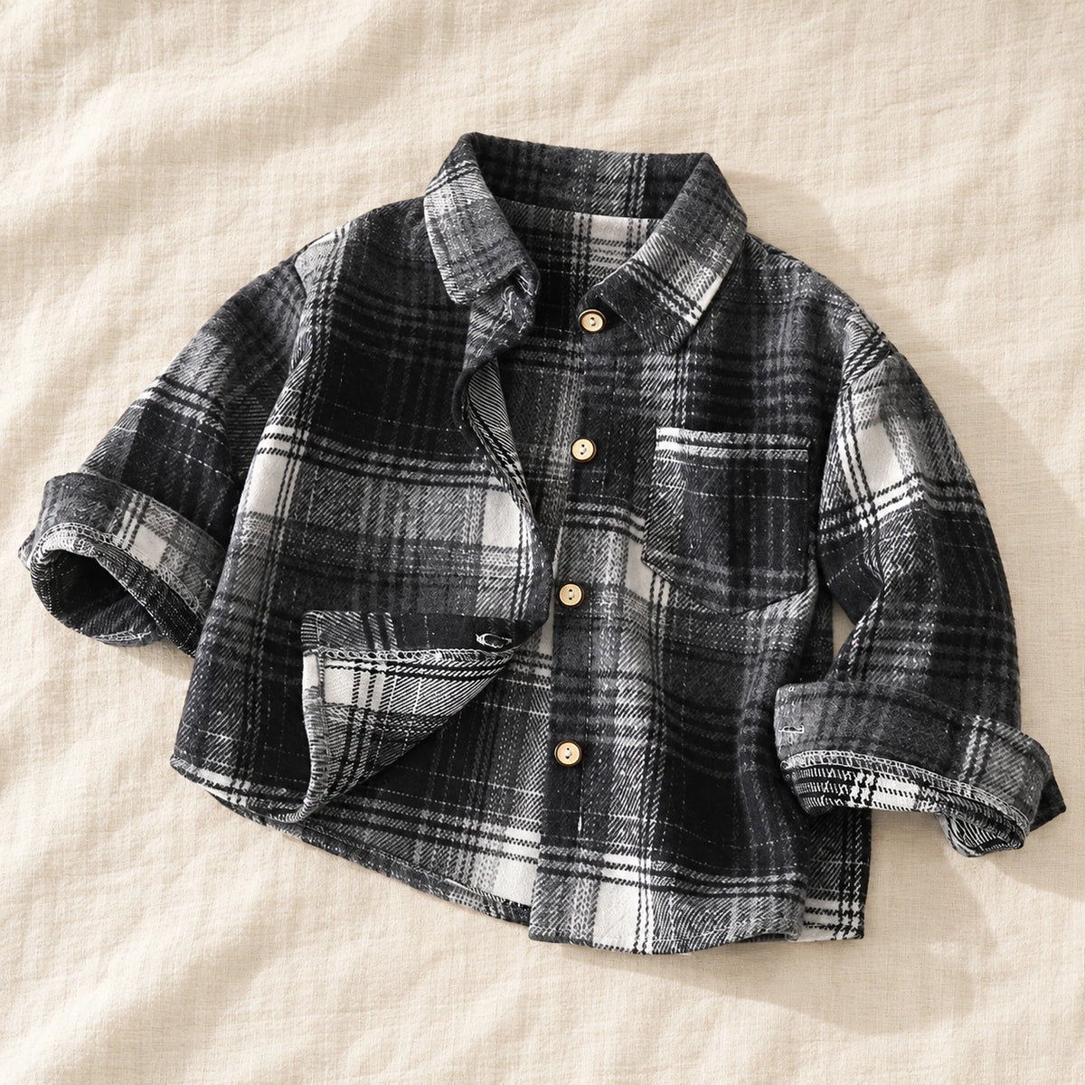 The Little Plaid Shirt Jacket — Black Check — studio product photograph