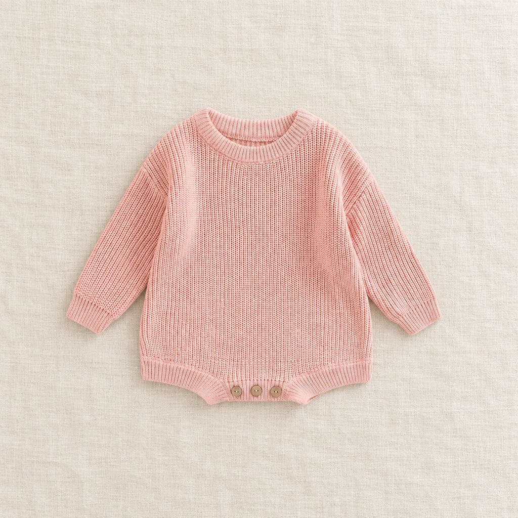 The Everyday Rib Knit Baby Bodysuit — Pink — studio product photograph