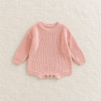 The Everyday Rib Knit Baby Bodysuit — Pink — studio product photograph
