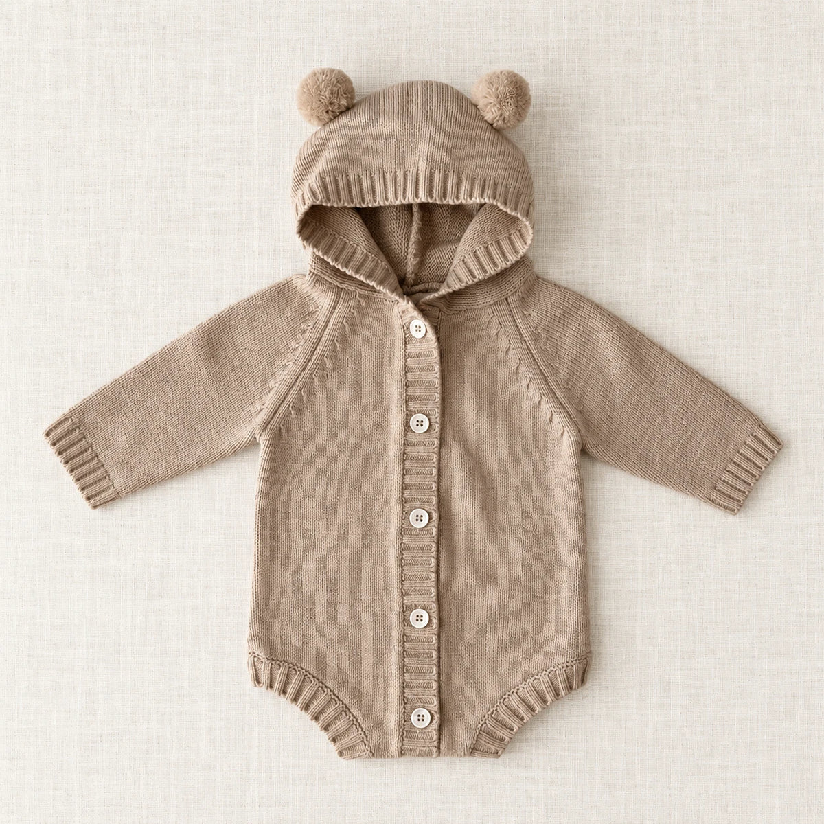 The Bear-Ear Hooded Knit Bodysuit — Khaki — studio product photograph