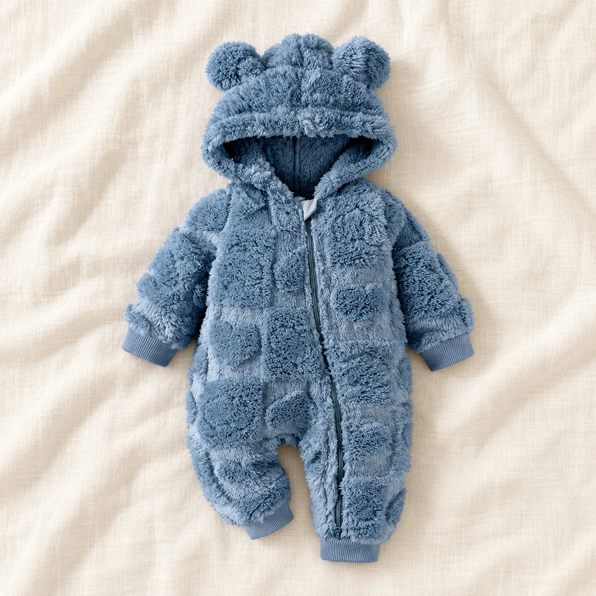 The Quilted Teddy-Hood Baby Romper — Blue — studio product photograph