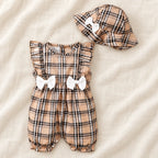 The Gingham Bow Romper & Hat Set — Tan Check & White Bows — studio product photograph