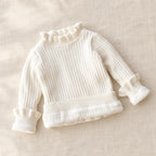 The Fleece-Lined Ruffle Knit Sweater — Beige — studio product photograph