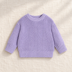 The Everyday Chunky Knit Sweater in Lavender, laid flat on ivory linen