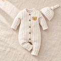 The Ivory Bear Romper & Hat Set on ivory linen