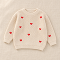 The Little Heart Knit Sweater on ivory linen