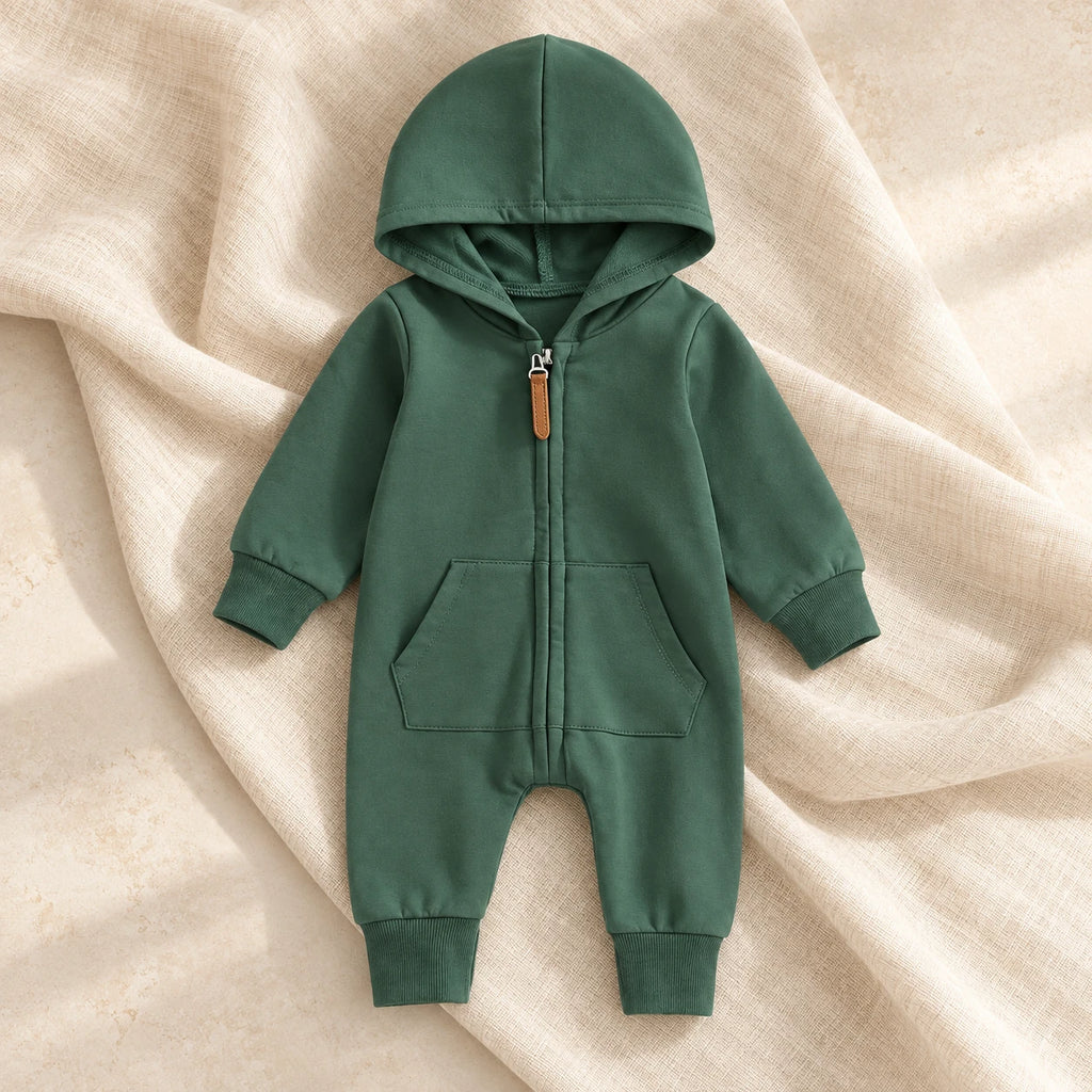 The Hooded Zip Baby Romper studio photograph on ivory linen