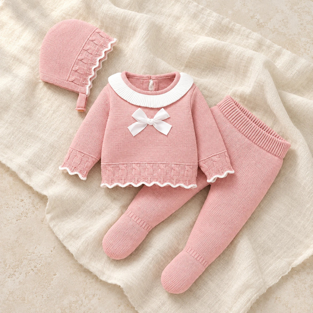 The Blush Knit Three-Piece Set studio photograph on ivory linen