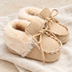 The Soft-Sole Baby Snow Boots studio photograph on ivory linen
