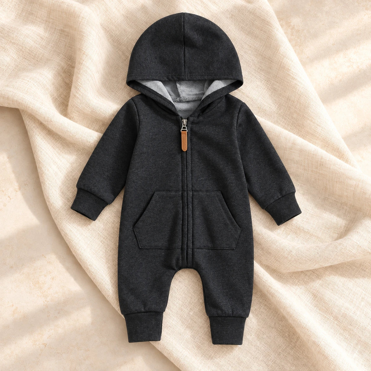 The Hooded Zip Baby Romper — Style 01 studio photo