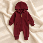 The Hooded Zip Baby Romper — Style 03 studio photo