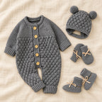 The Newborn Knit Wardrobe — Charcoal, Complete Set in boutique studio photograph