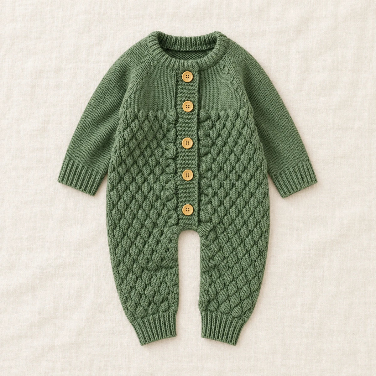 The Newborn Knit Wardrobe — Forest, Romper in boutique studio photograph