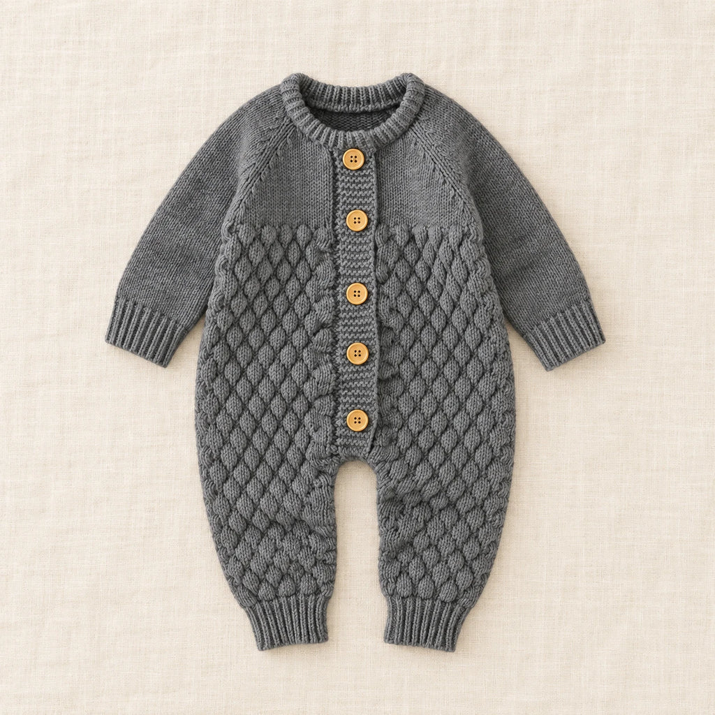 The Newborn Knit Wardrobe — Charcoal, Romper in boutique studio photograph