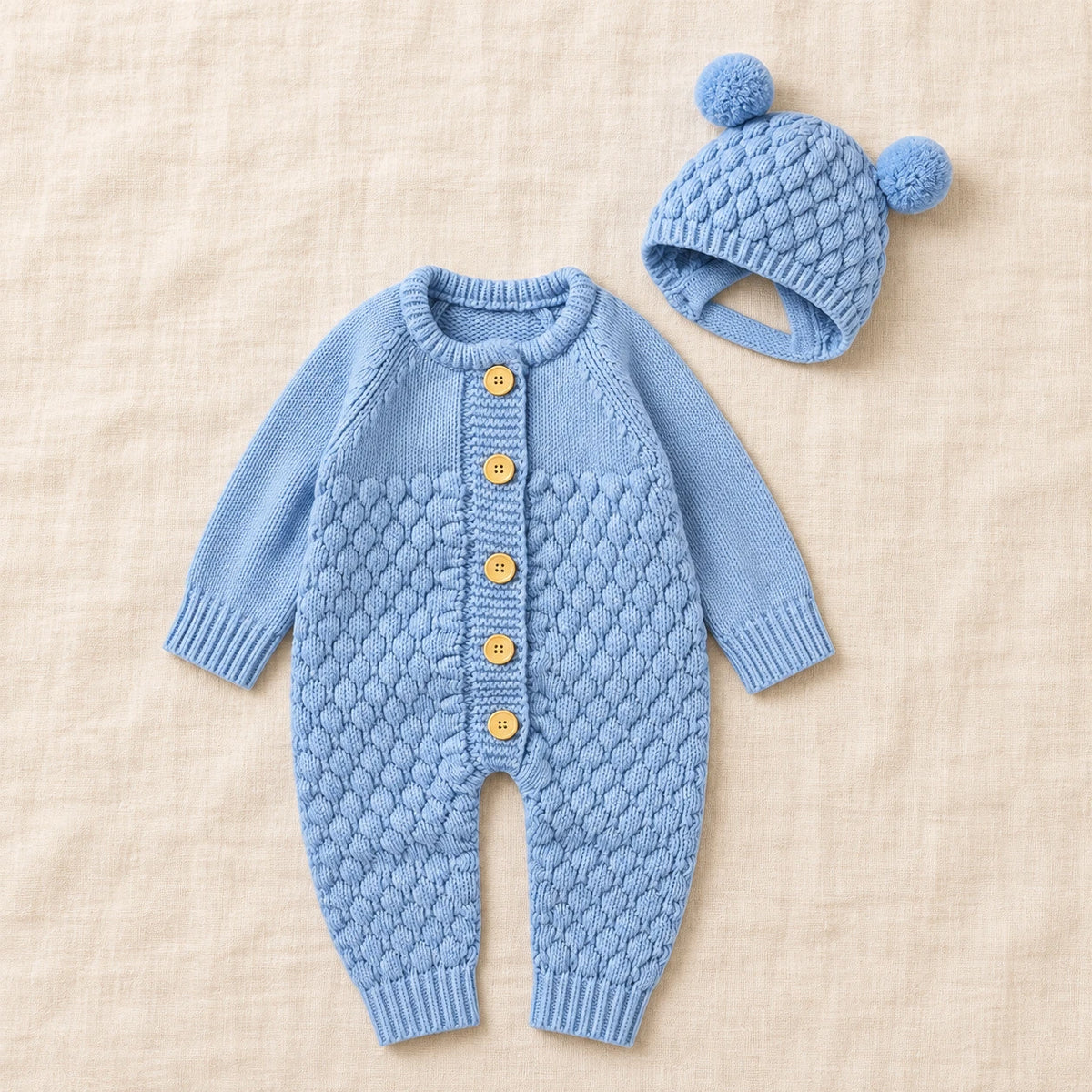 The Newborn Knit Wardrobe — Blue, Romper & Hat in boutique studio photograph