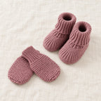 The Newborn Knit Wardrobe — Mauve, Booties & Mittens in boutique studio photograph