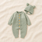The Newborn Knit Wardrobe — Sage, Romper & Hat in boutique studio photograph