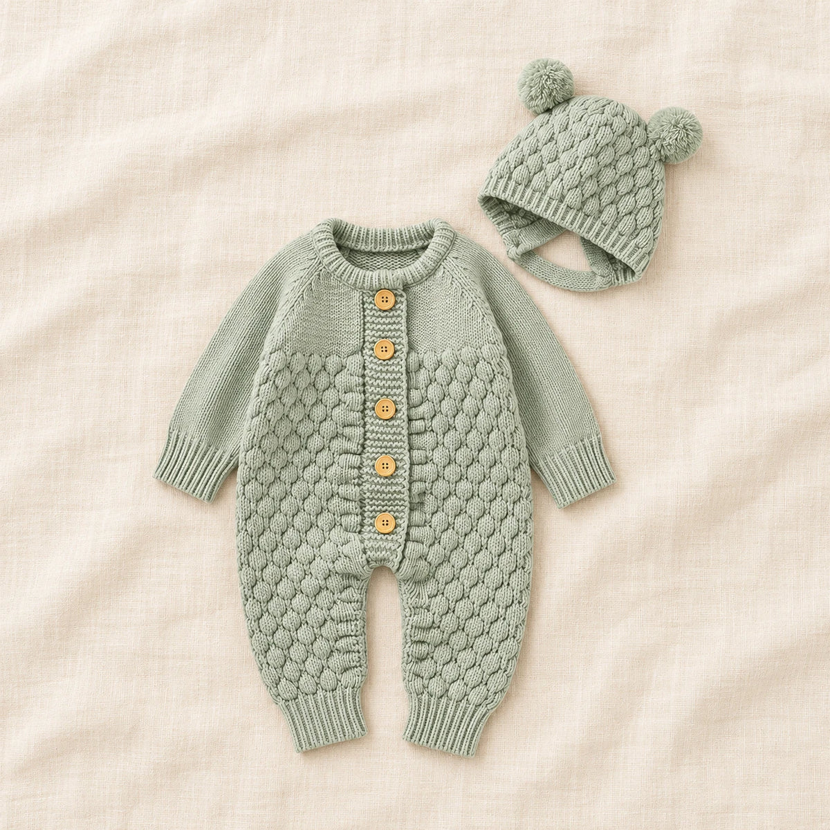 The Newborn Knit Wardrobe — Sage, Romper & Hat in boutique studio photograph