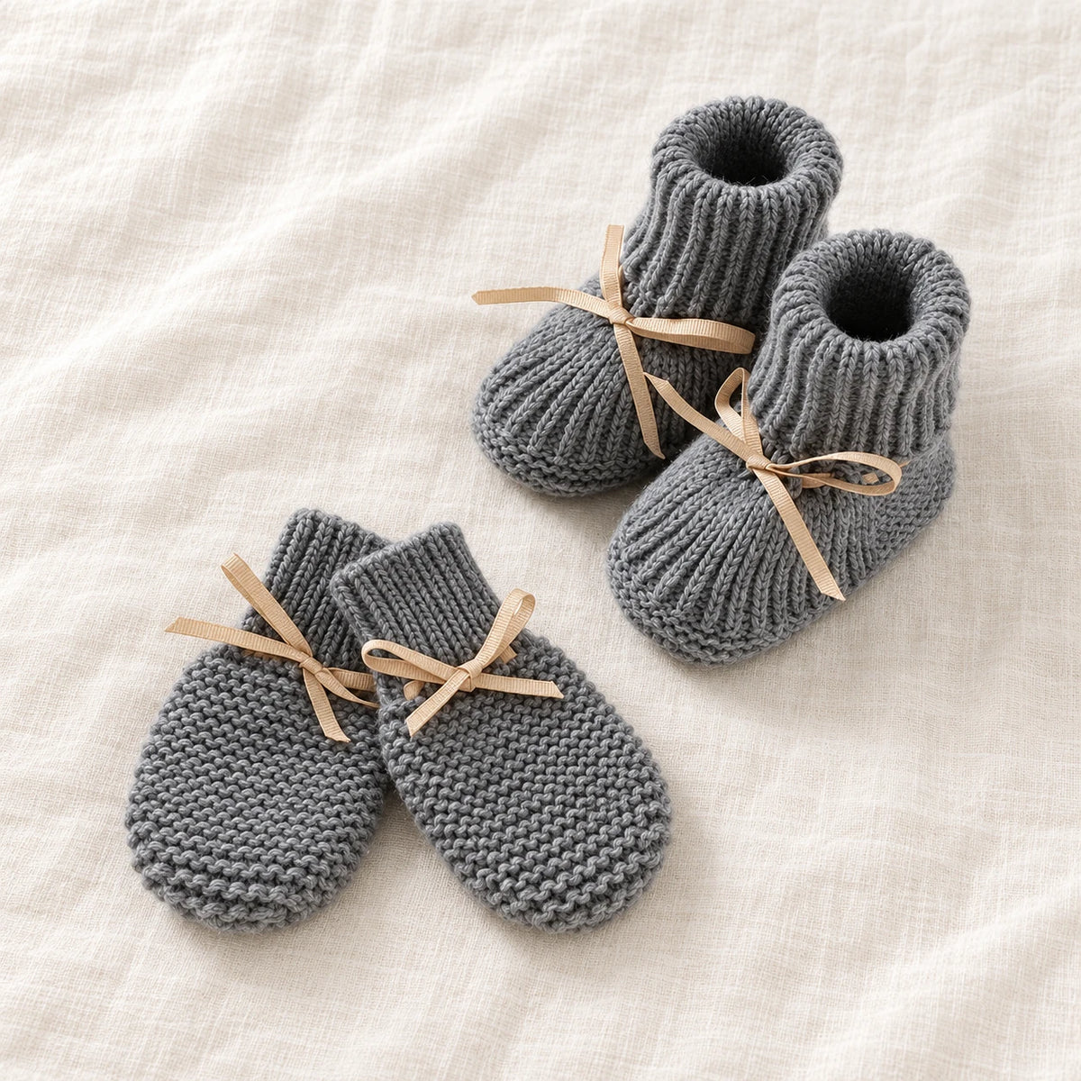 The Newborn Knit Wardrobe — Slate Ribbon, Booties & Mittens in boutique studio photograph
