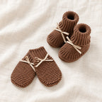 The Newborn Knit Wardrobe — Cocoa Ribbon, Booties & Mittens in boutique studio photograph