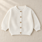 The Ribbed Button Knit Cardigan on ivory linen