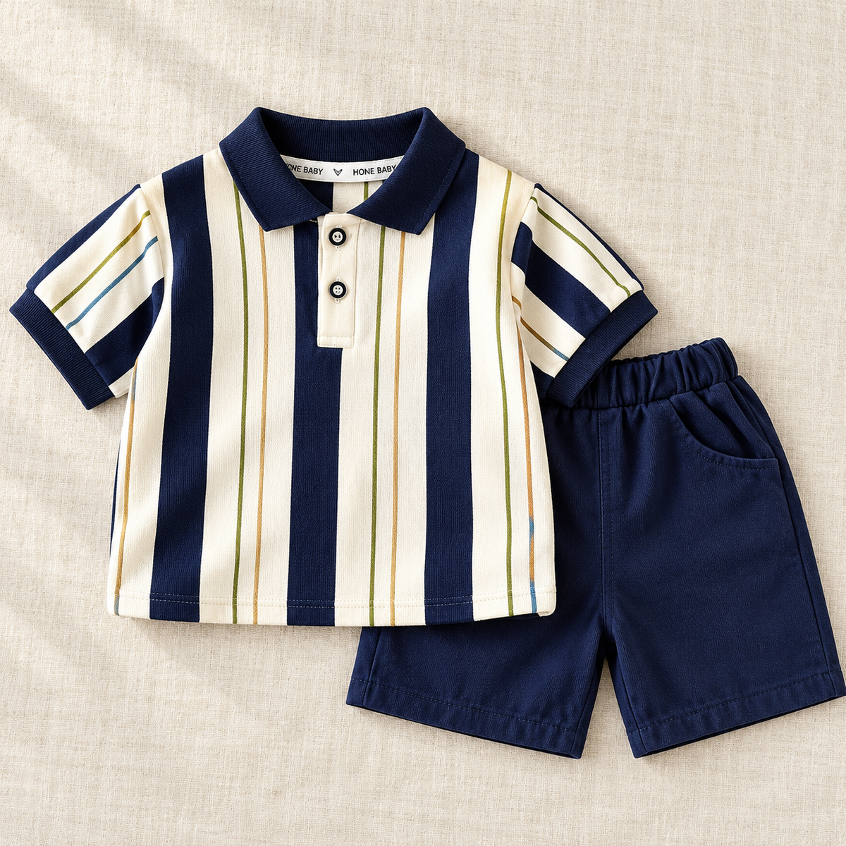 The Stripe Polo & Shorts Set on ivory linen