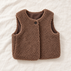 The Teddy Button Vest on ivory linen