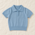 The Knit Polo & Shorts Separates — Blue Polo, laid flat on ivory linen