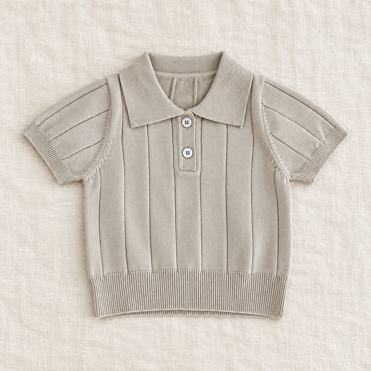 The Knit Polo & Shorts Separates — Beige Polo, laid flat on ivory linen