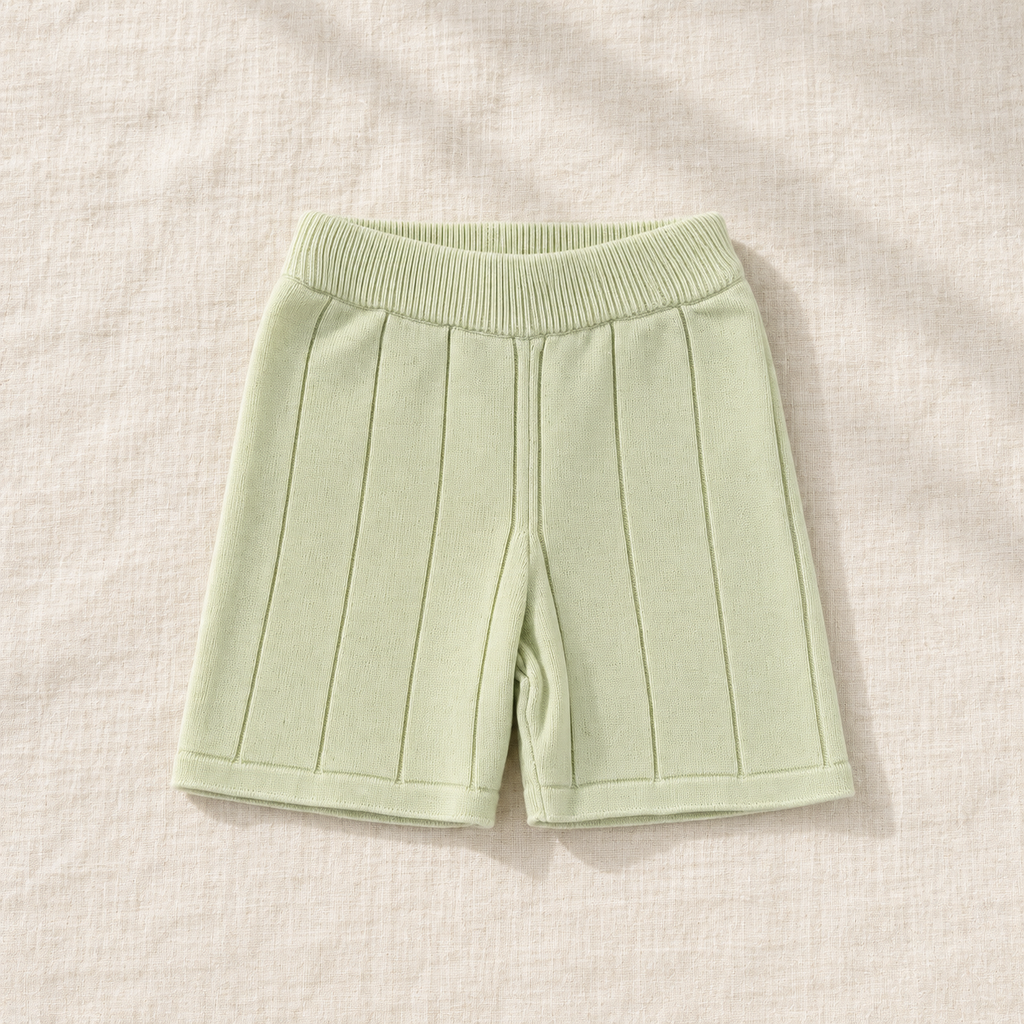 The Knit Polo & Shorts Separates — Light Green Shorts, laid flat on ivory linen