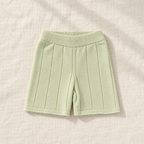 The Knit Polo & Shorts Separates — Light Green Shorts, laid flat on ivory linen