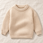 The Everyday Textured Knit Sweater — Beige · Classic Knit, laid flat on ivory linen