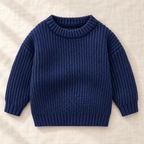 The Everyday Textured Knit Sweater — Navy Blue · Classic Knit, laid flat on ivory linen