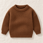 The Everyday Textured Knit Sweater — Brown · Classic Knit, laid flat on ivory linen