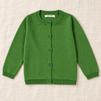 The Everyday Fine Knit Cardigan — Green, laid flat on ivory linen