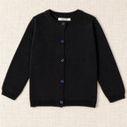 The Everyday Fine Knit Cardigan — Black, laid flat on ivory linen