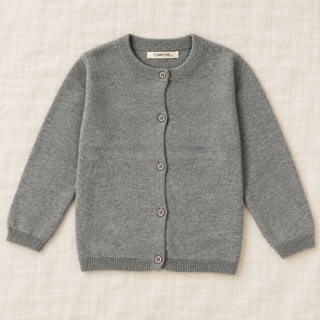 The Everyday Fine Knit Cardigan — Gray, laid flat on ivory linen
