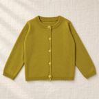 The Everyday Fine Knit Cardigan — Muted Yellow, laid flat on ivory linen