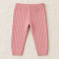 The Everyday Rib Knit Leggings — Pink, laid flat on ivory linen
