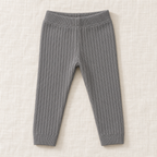 The Everyday Rib Knit Leggings — Dark Grey, laid flat on ivory linen