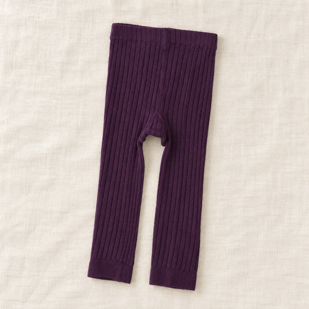 The Everyday Rib Knit Leggings — Purple, laid flat on ivory linen