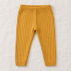 The Everyday Rib Knit Leggings — Yellow, laid flat on ivory linen