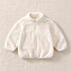 The Plush Zip Jacket — Ivory, laid flat on ivory linen