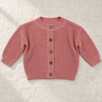 The Ribbed Button Knit Cardigan — Rose Pink, laid flat on ivory linen
