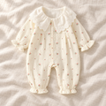 The Peter Pan Floral Baby Romper — Style 01 studio photograph