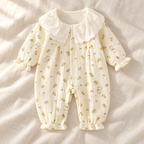 The Peter Pan Floral Baby Romper — Style 03 studio photograph