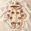 The Bear Hooded Knit Romper studio photograph on ivory linen